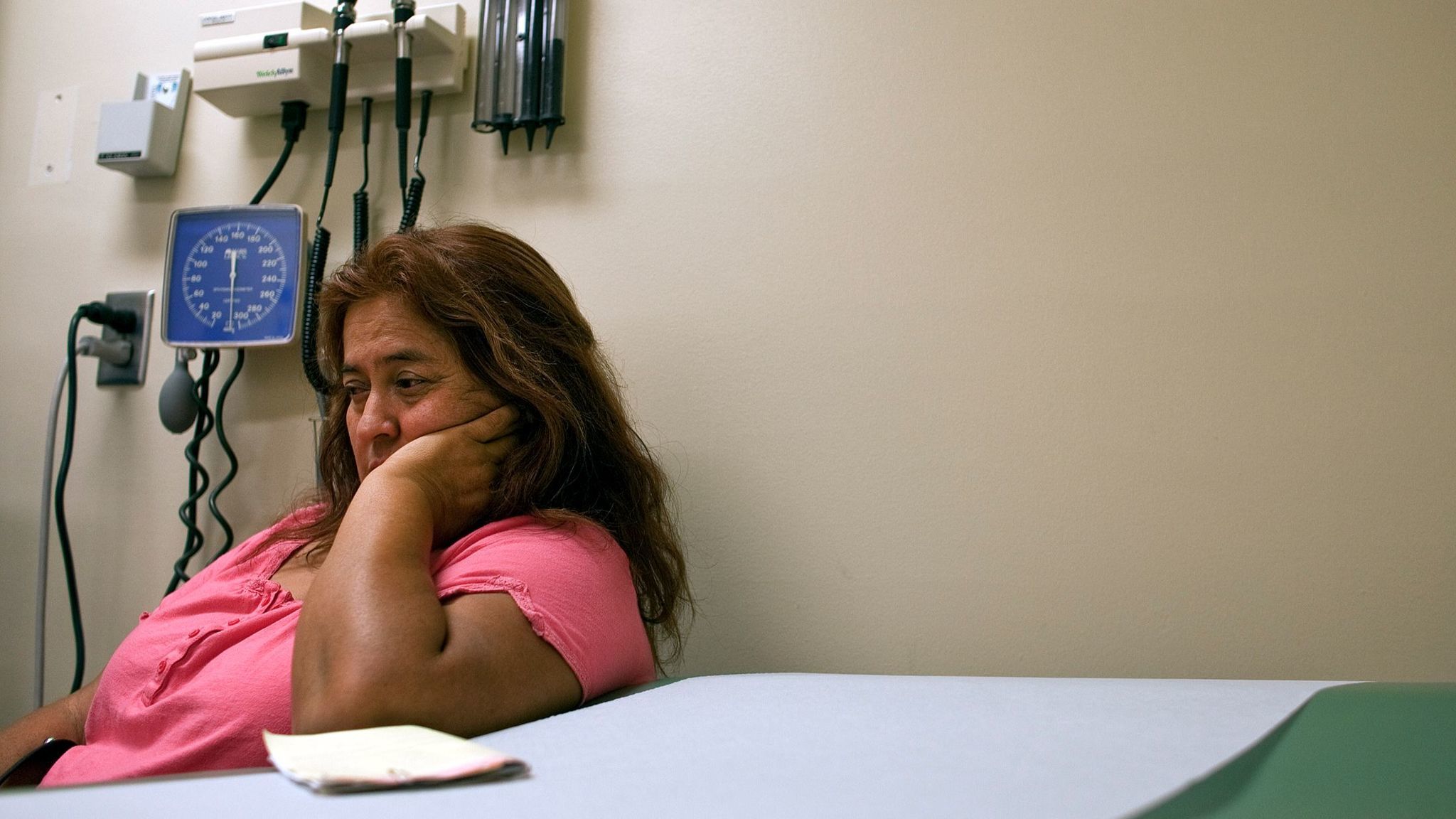 A patient waits in an examining room to see a doctor for her issues with depression and anxiety. Depression is more common among transgender than cisgender adults, a study finds.
