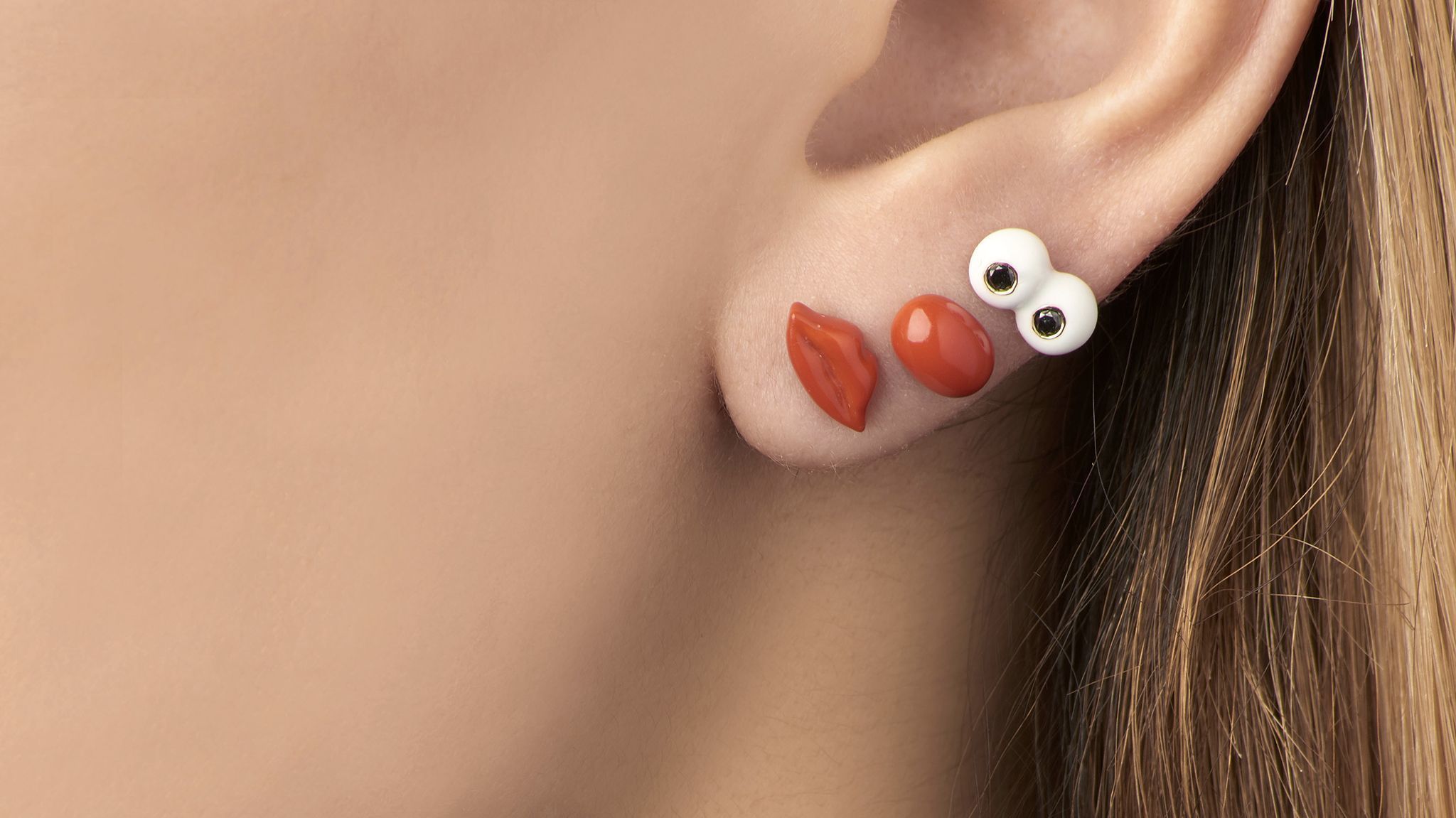 An earring ensemble by Alison Lou, designed for consumers with multiple piercings.