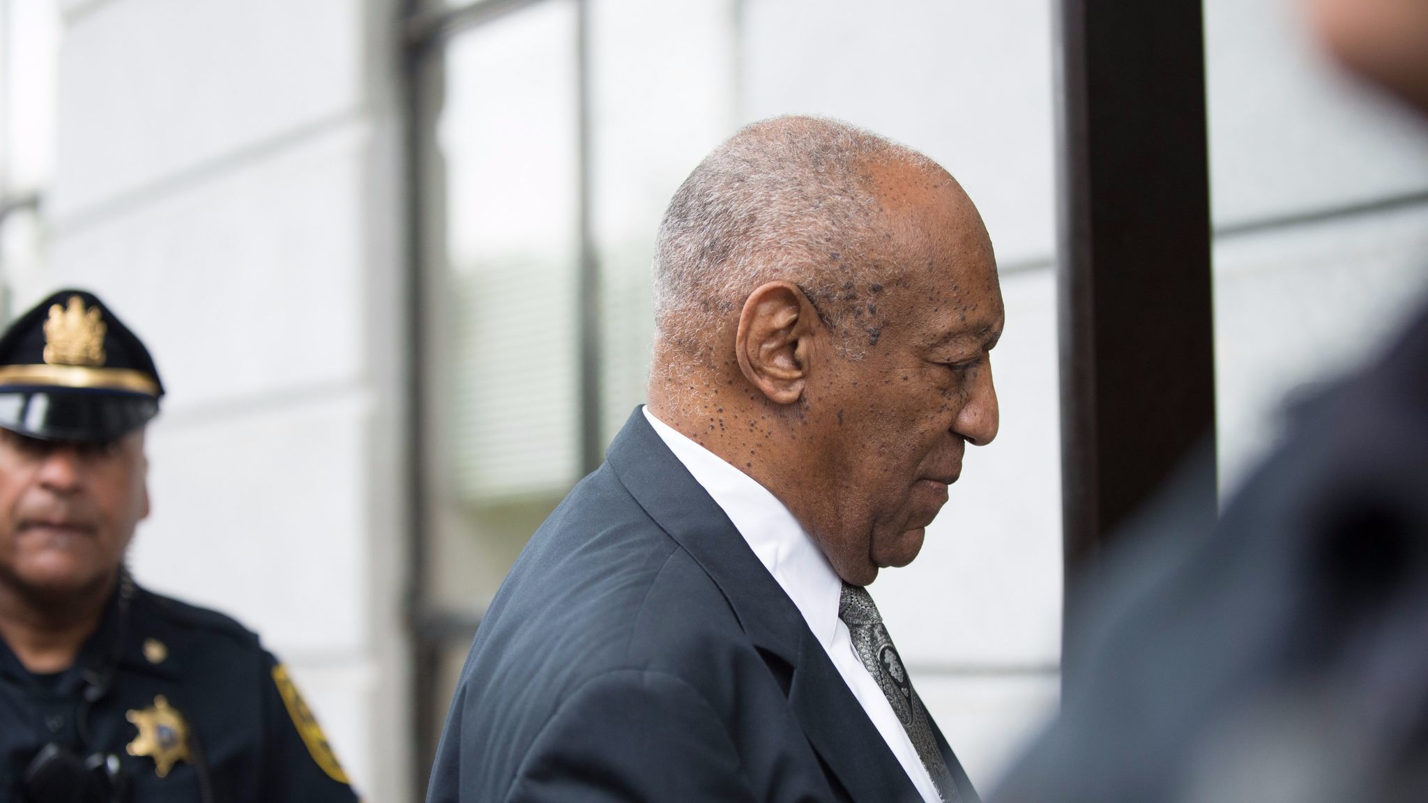 Bill Cosby arrives at the Montgomery County Courthouse for a sixth day of jury deliberations in the trial against him.