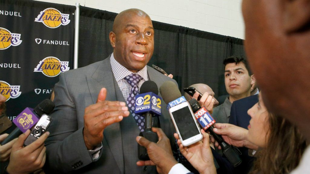 Magic Johnson speaks with members of the media after Rob Pelinka was announced as the new Lakers general manager.