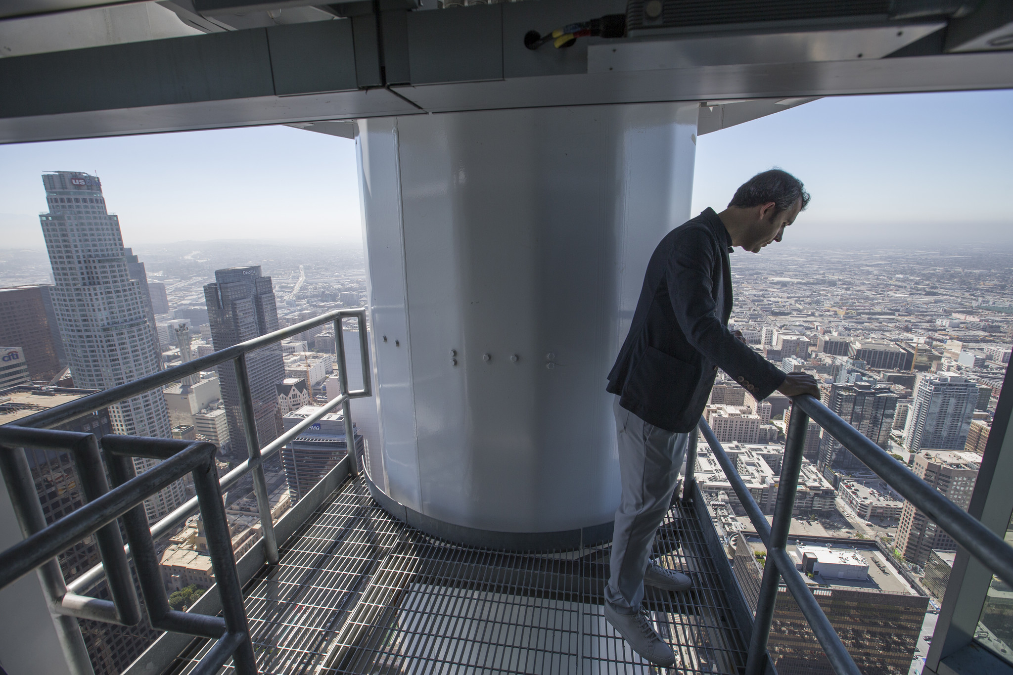 Brad Gwinn, StandardVision chief operations officer, looks out from inside the sail atop of the InterContinental Los Angeles bar on the 73rd floor of the Wilshire Grand Center.