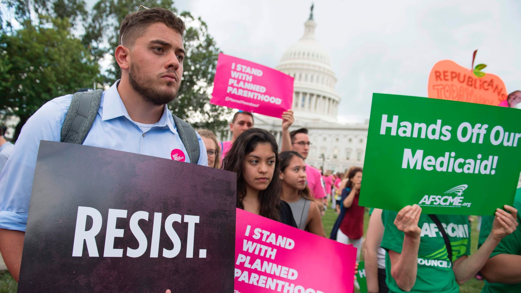 Supporters of Planned Parenthood demonstrate against healthcare legislation proposed by Senate Republicans.
