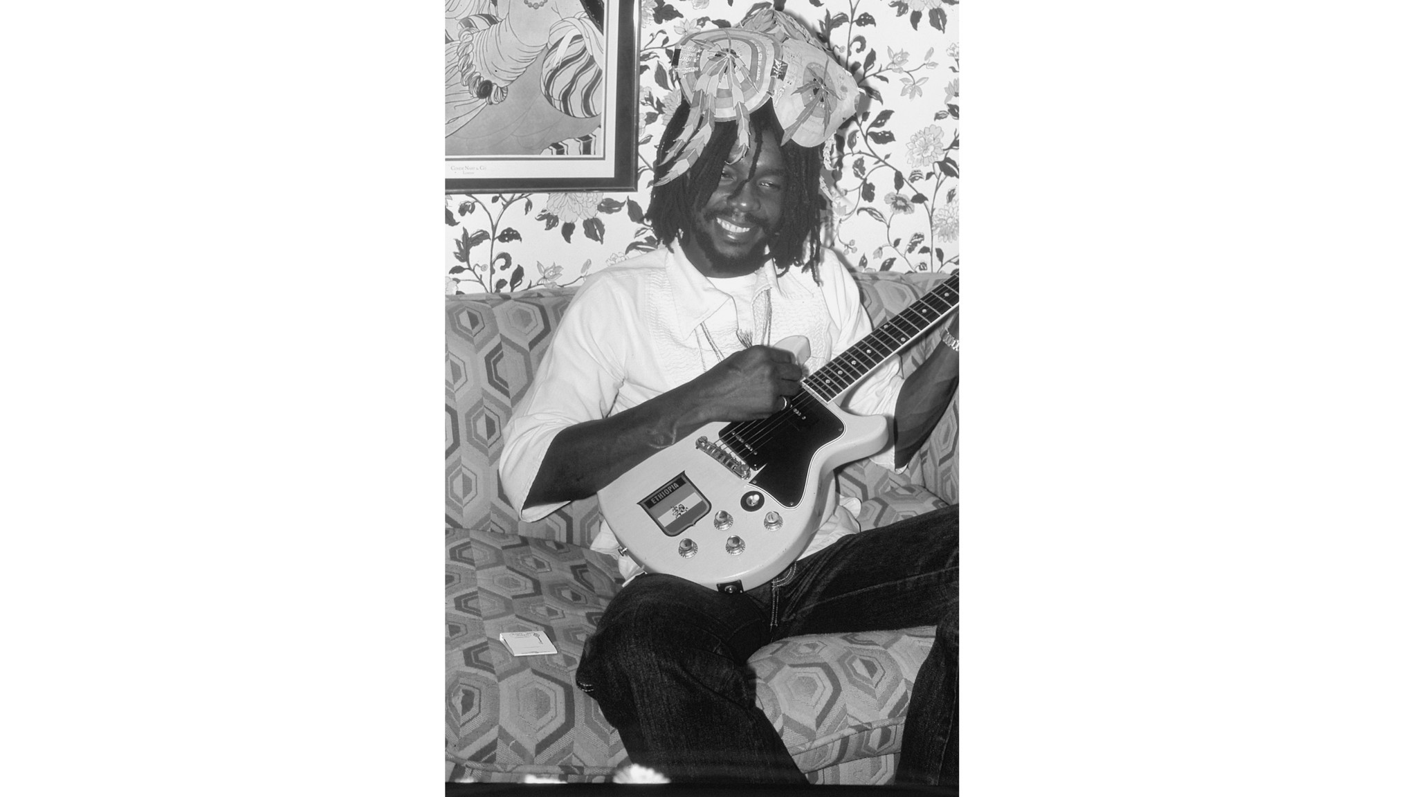 Wailers co-founder Peter Tosh, wearing a hat with the words to "Legalize It" in Hollywood in 1979.
