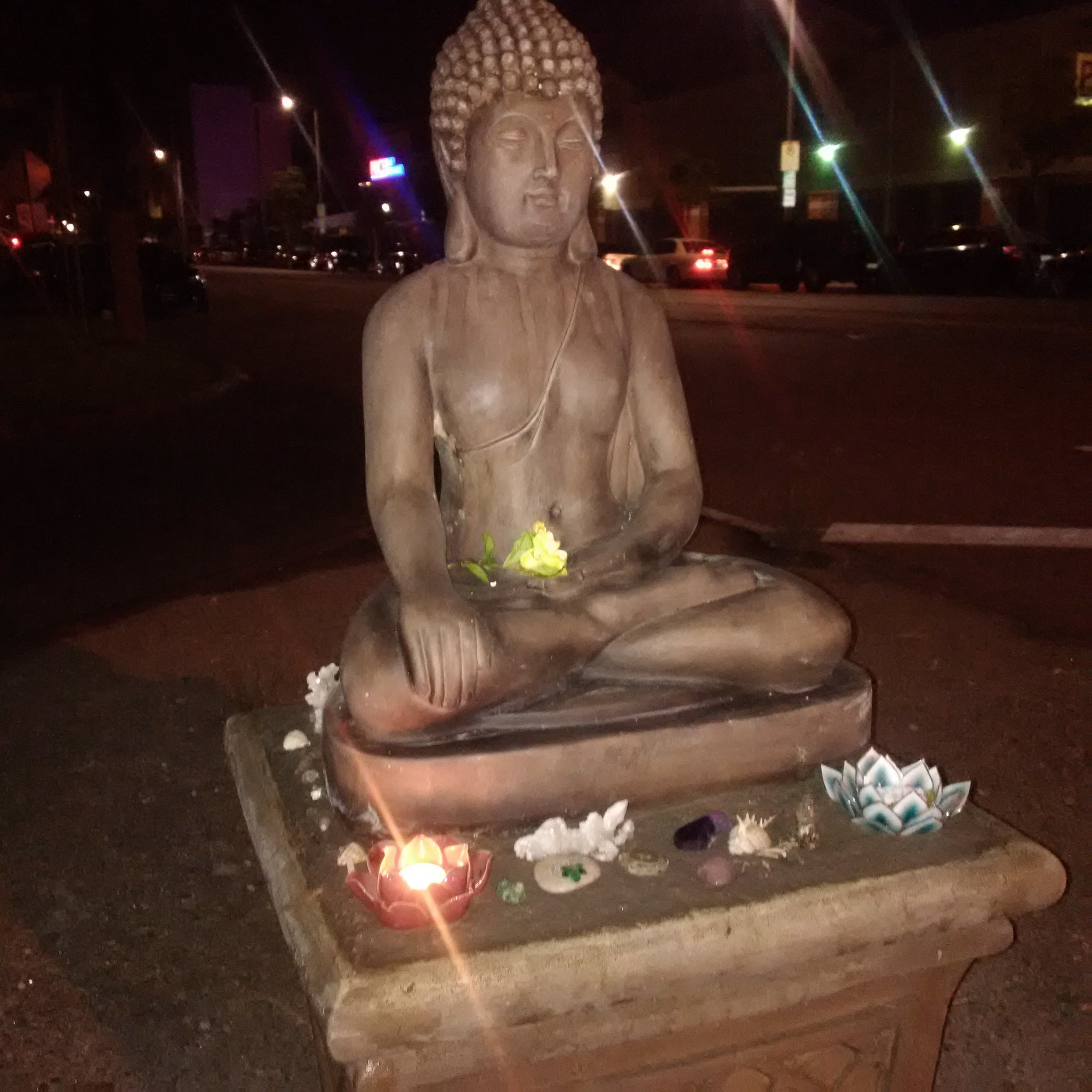 After years of bulky items being left on a traffic island in Palms, someone put a Buddha statue there. Residents treasure the statue, which has been vandalized multiple times.