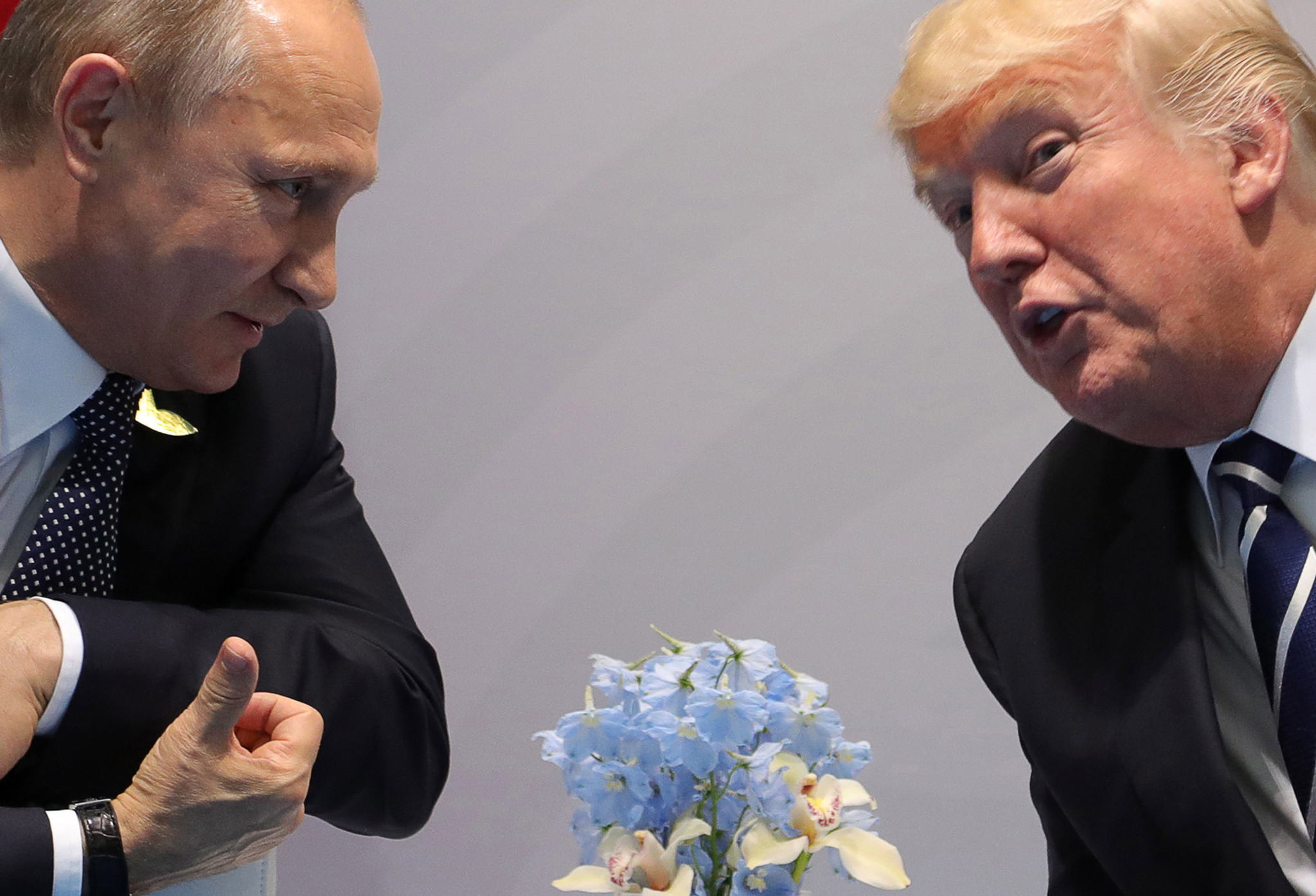 Russian President Vladimir Putin, left, and President Trump talk on the sidelines of the Group of 20 summit meeting in July in Hamburg, Germany.