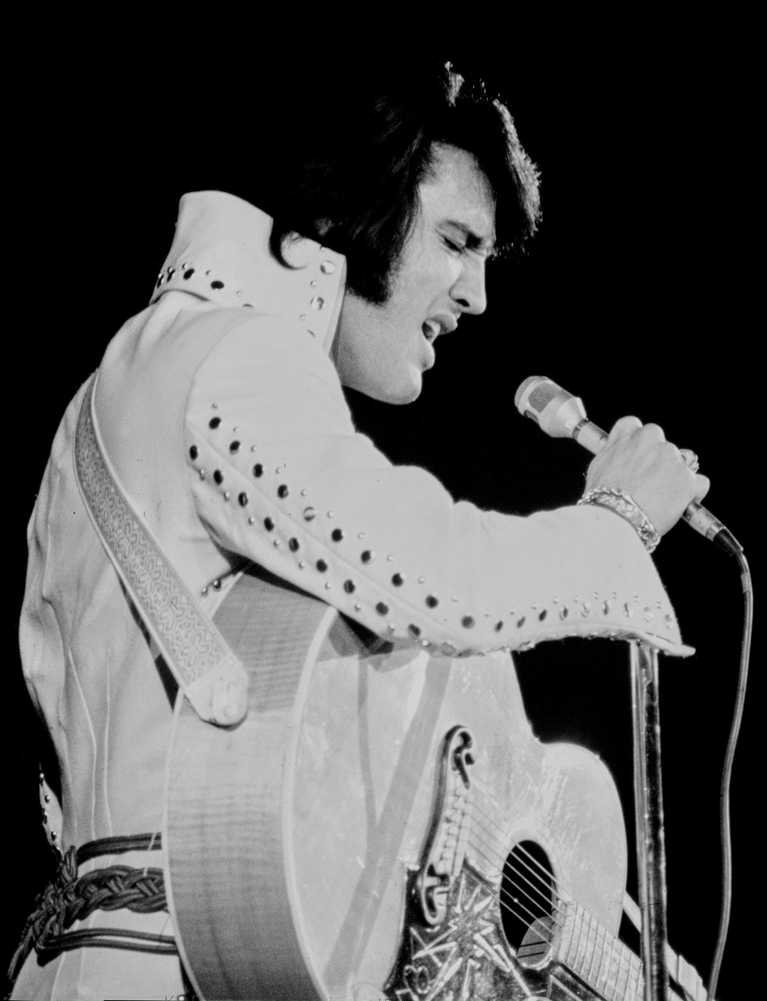 During the 1970s. Elvis was famous for his jewel-encrusted jumpsuits. He's seen here performing at the International on Aug. 17, 1971.