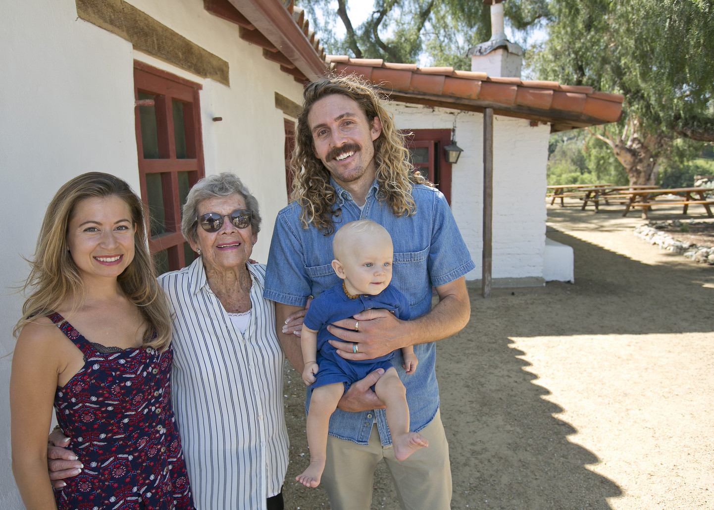Marie Lawson with grandson Nate Larson, his wife Susan and her great-grandson Russell.