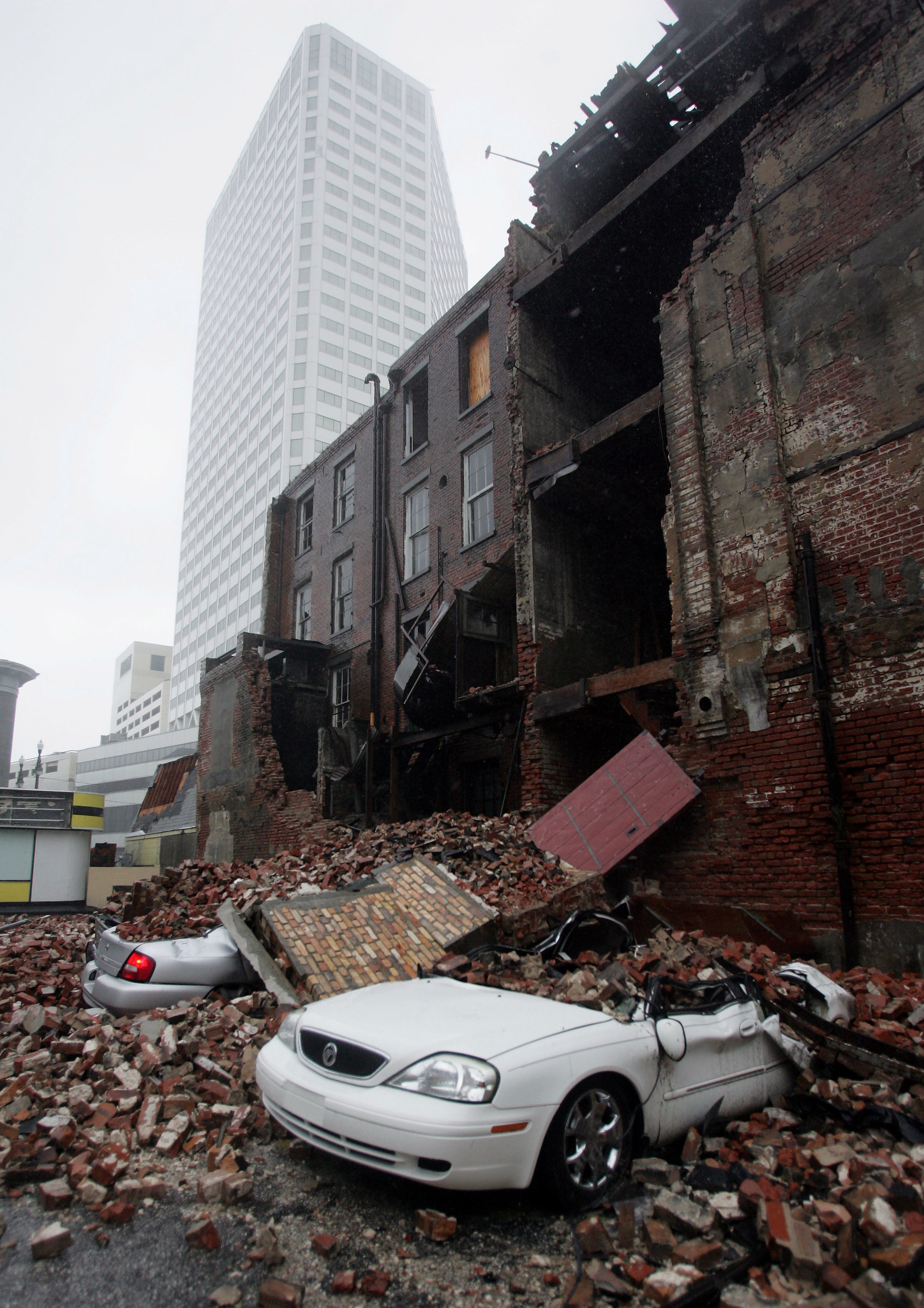 Debris from a fallen building covers streets in downtown New Orleans.