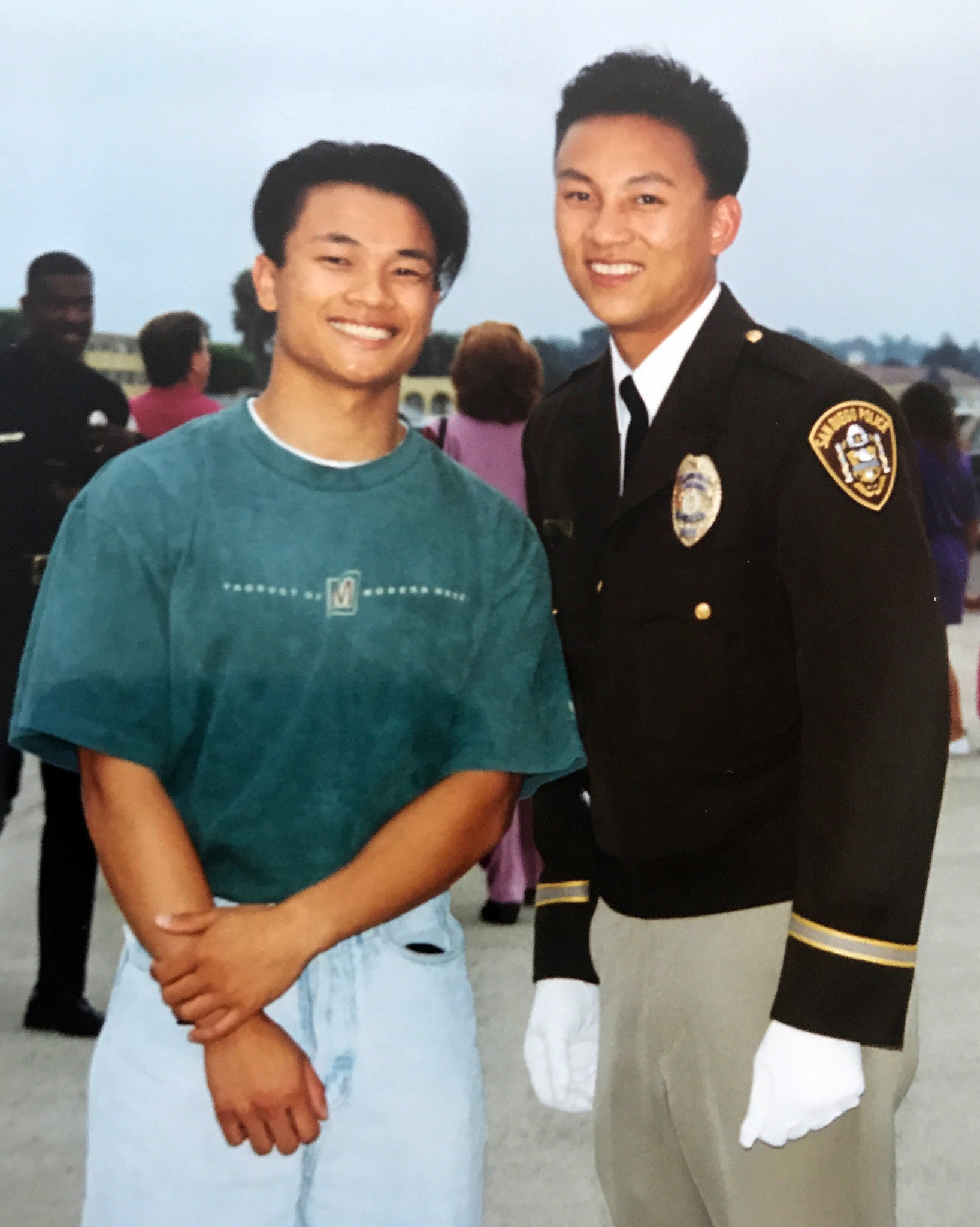 Timothy Vu, right, pictured with his brother, Tom, after graduating from the police academy in San Diego in 1993 at age 23.