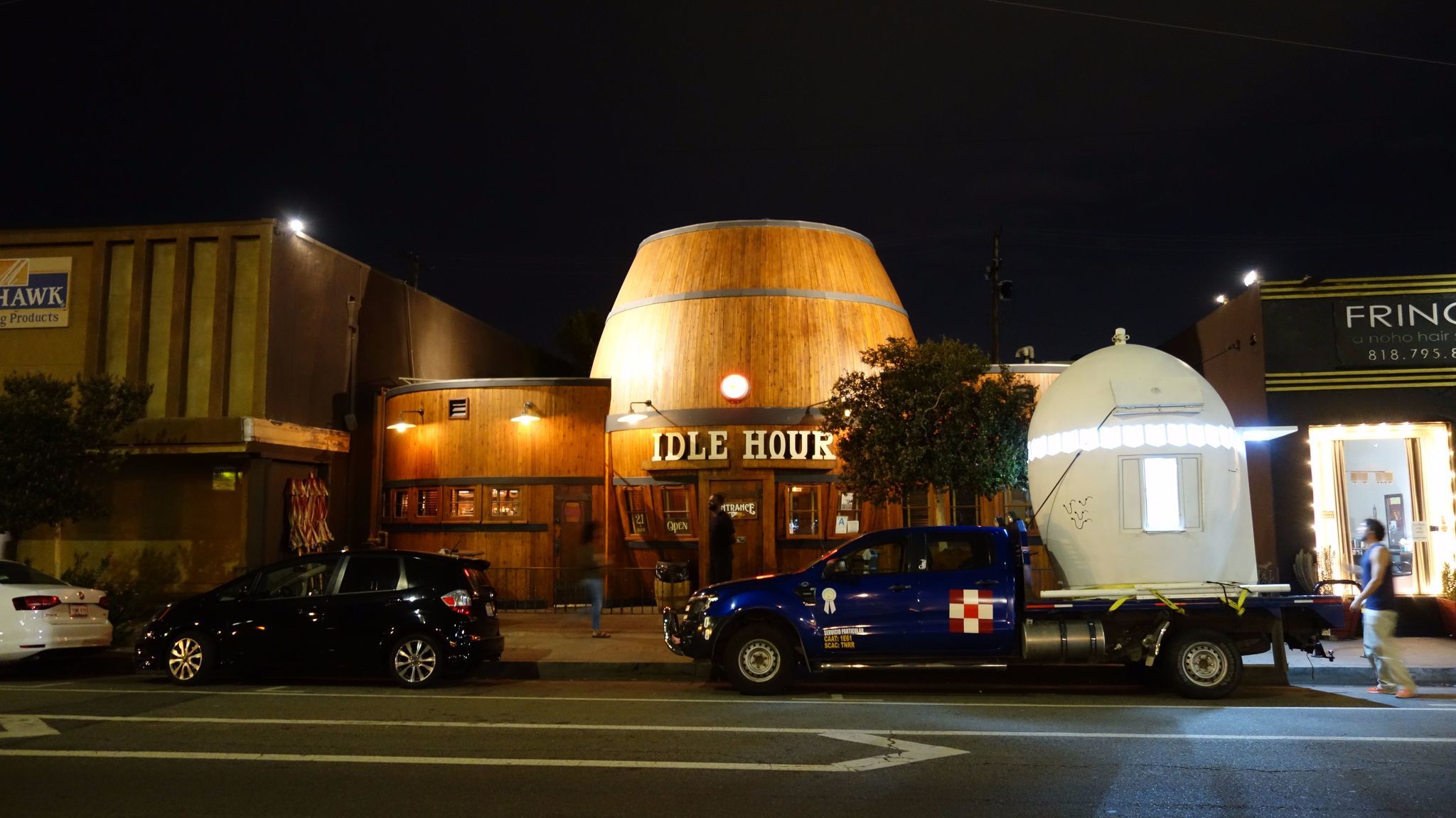 The NuMu parked outside the Idle Hour bar in North Hollywood, which is shaped like a barrel.