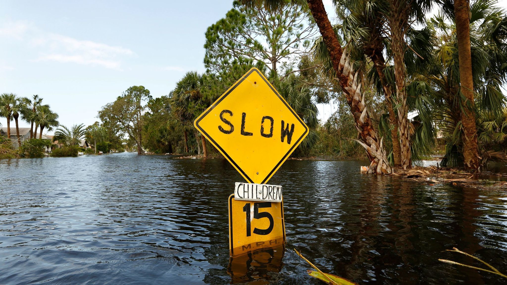 In Bonita Springs, Fla., floodwaters reached waist deep in some areas, flooding homes and cars.
