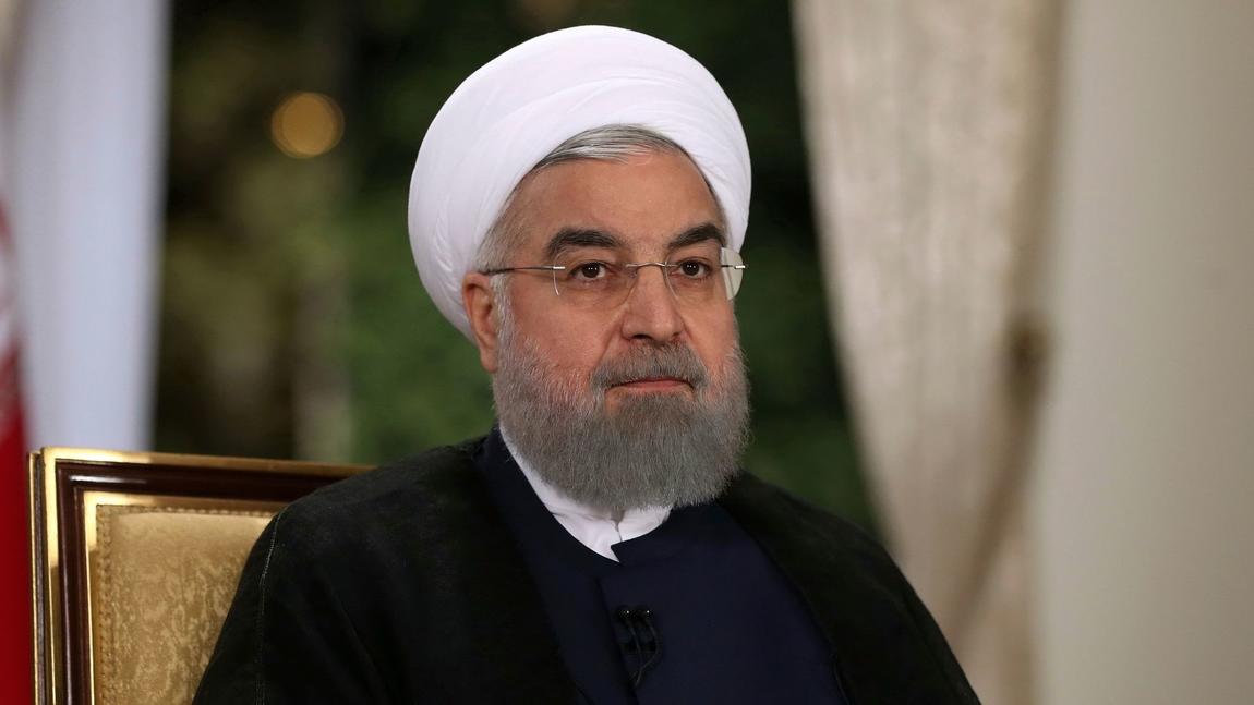 Iranian President Hassan Rouhani attends an interview with state-run TV at the presidency office in Tehran.