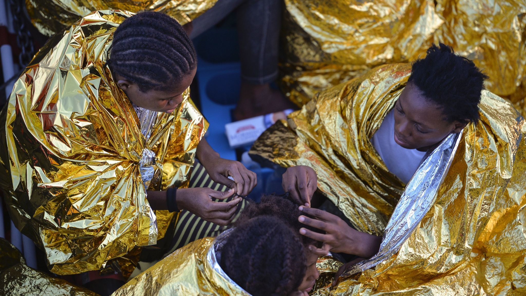 African women aboard the Topaz Responder after a rescue operation of migrants and refugees off the Libyan coast in the Mediterranean Sea in 2016. The arrive in the hundreds every month. Many of them are destined for years of sexual slavery.