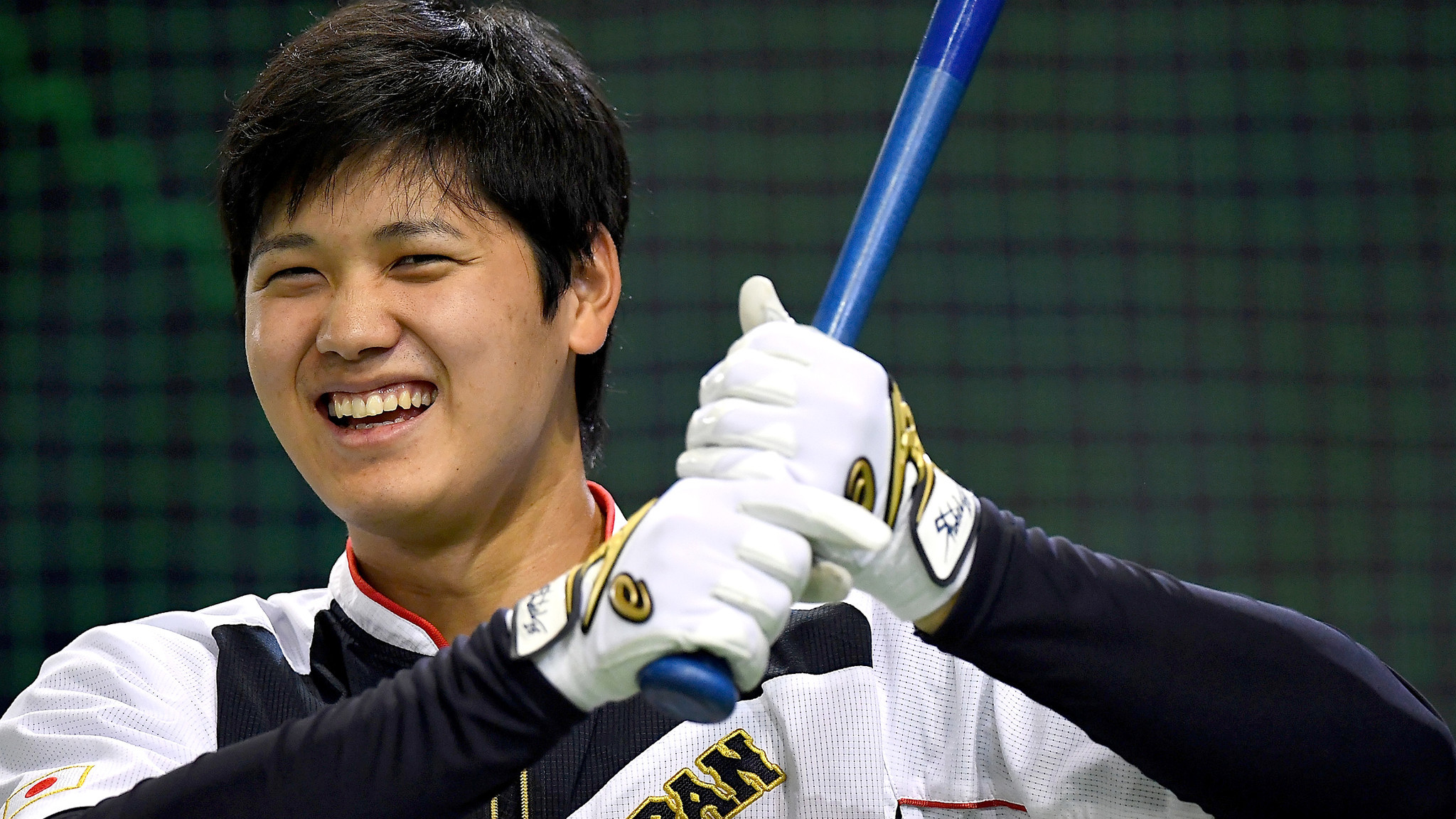 Shohei Ohtani warms up ahead of an international friendly game between Japan and the Netherlands at the Tokyo Dome on Nov. 12, 2016.