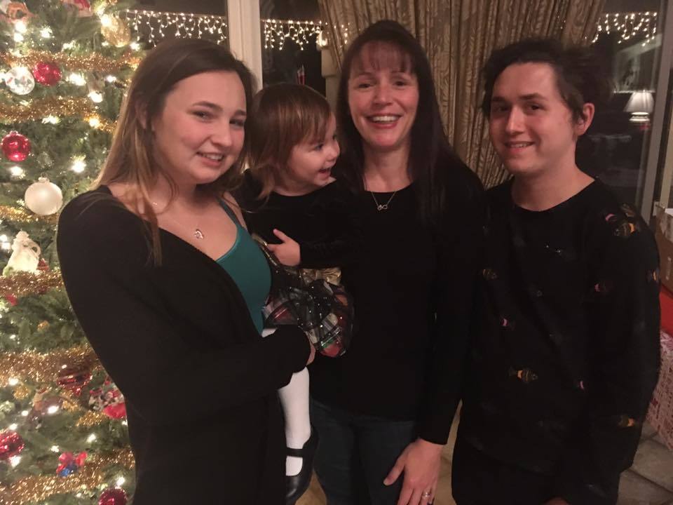 Candace Bowers, second from right, with her three children.