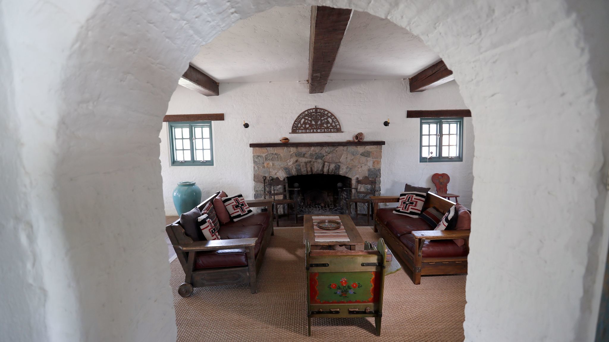 The home features a series of curved arches.