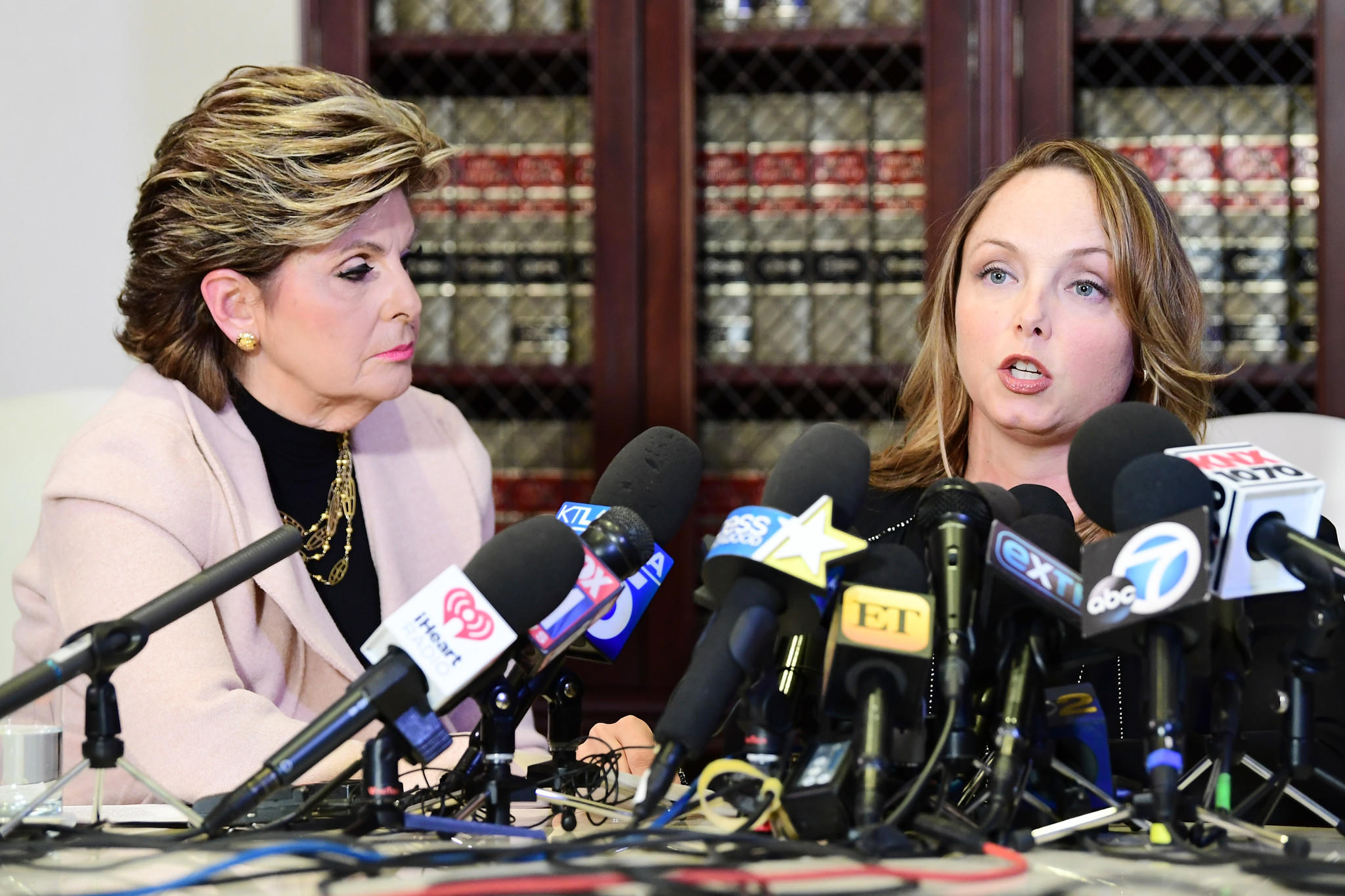 Attorney Gloria Allred, left, and client Louisette Geiss speak during a news conference at Allred's office on Tuesday. (Emma McIntyre / Getty Images)