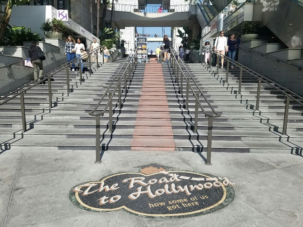 "The Road to Hollywood" begins on Hollywood Boulevard, then climbs the stair in a red-cement "carpet."
