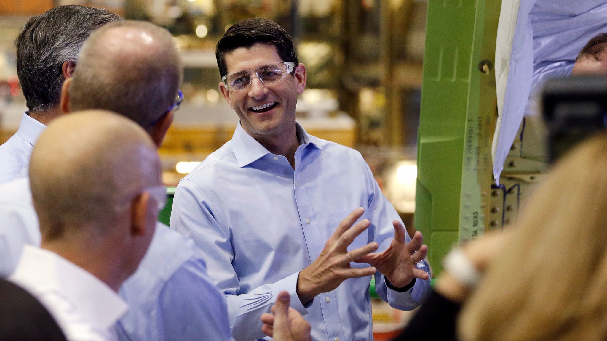 House Speaker Paul D. Ryan (R-Wis.) talks with Boeing Co. employees while on a tour of the airplane factory in Everett, Wash., in August.