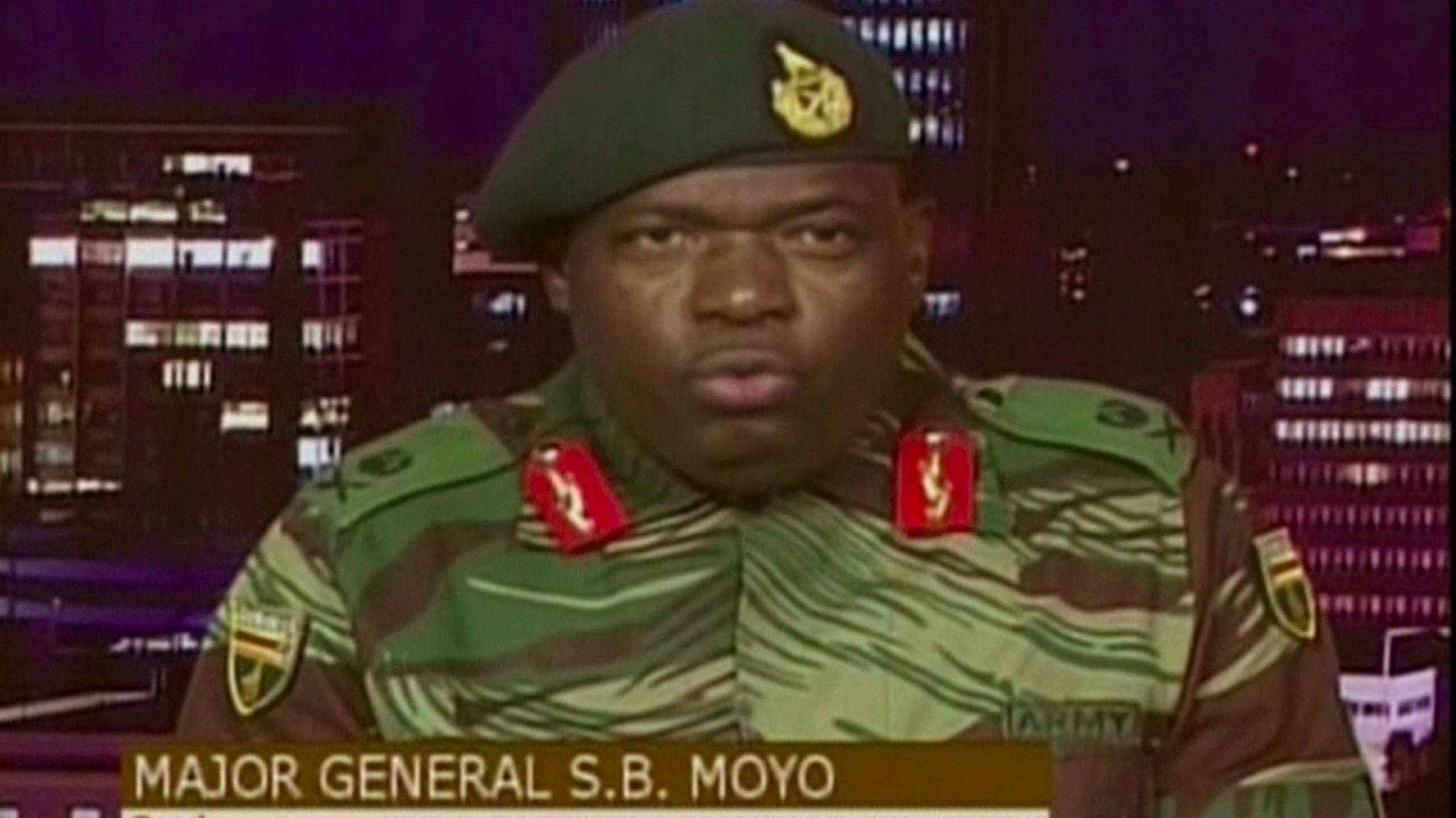 In this image made from video, Major Gen. S.B. Moyo, Spokesperson for the Zimbabwe Defense Forces ad