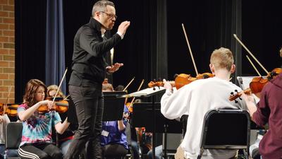 Elgin Symphony Orchestra conductor coaches Larkin students, encourages love of music