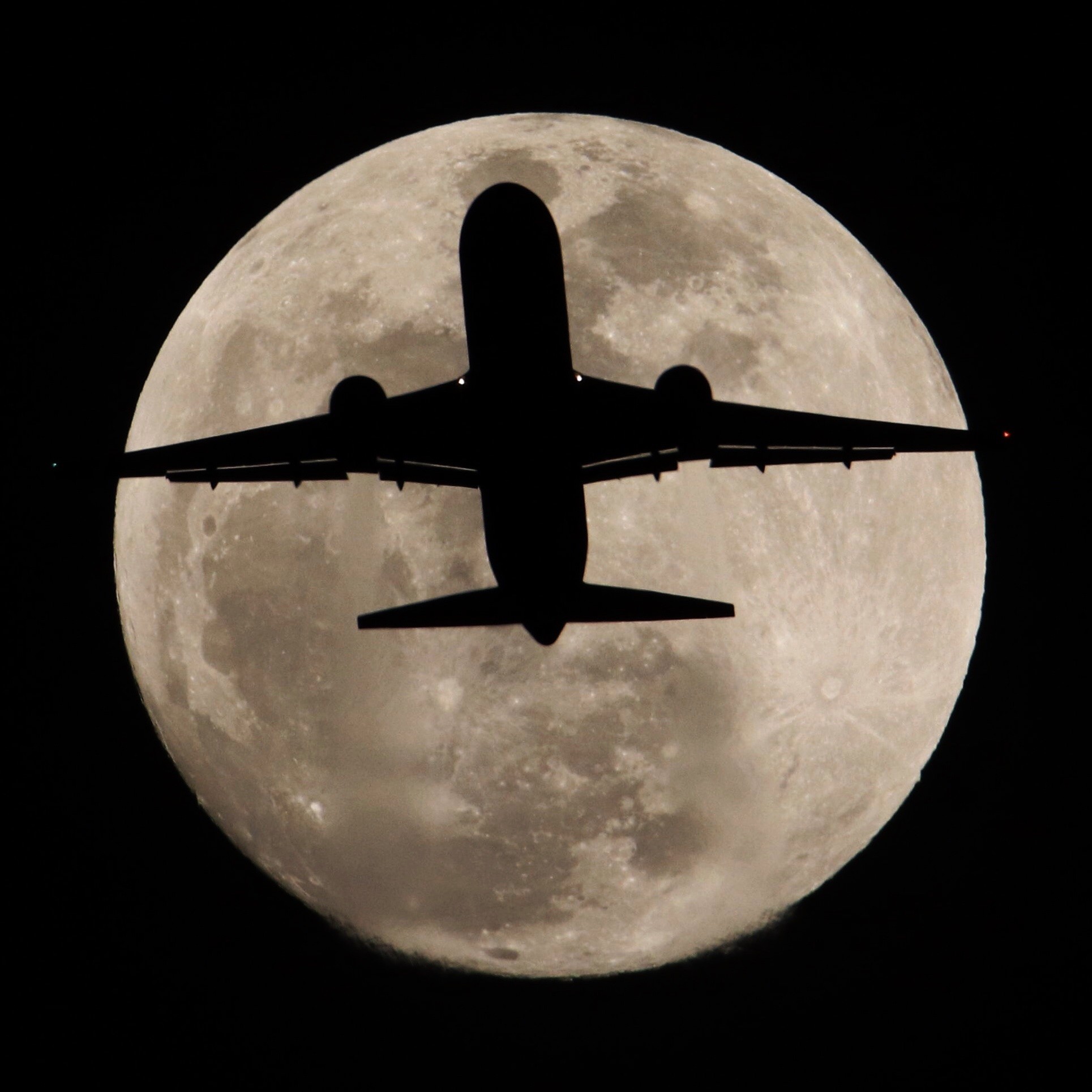 Jan. 30, 2018: Airliner crosses in front of full moon over Whittier, California, Tuesday evening. Th