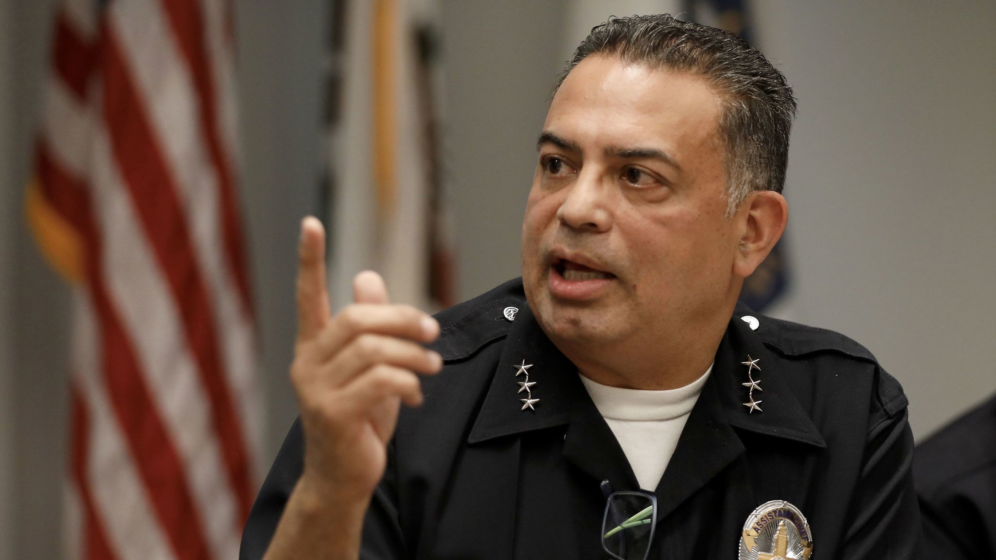 LOS ANGELES, CA-NOVEMBER 15, 2017: Jorge Villegas, Assistant Chief Director, LAPD, talks to reporte