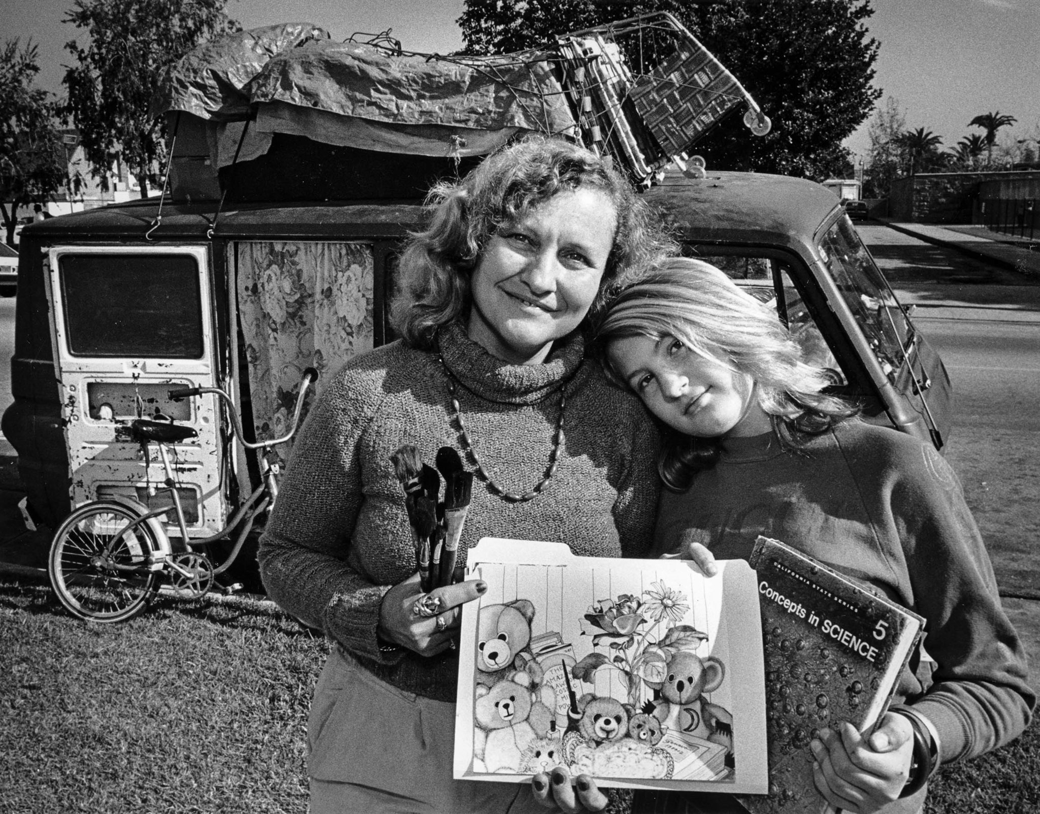 Jan. 12, 1987: Geneva Reese, 36, and daughter Eve, 13, live in a van. Geneva, an artist, holds her s