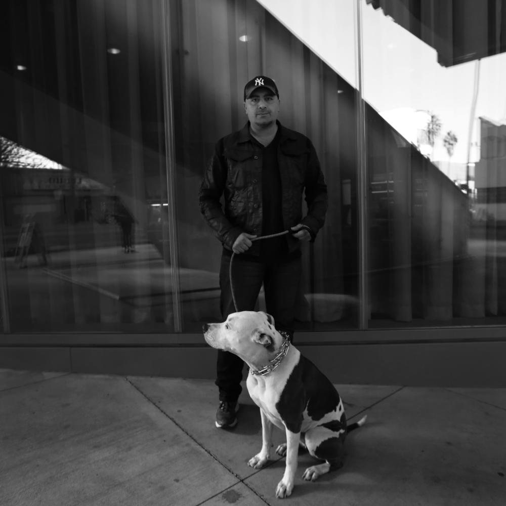 George Abou-Daoud with his dog Hudson at one of his restaurants in Hollywood.