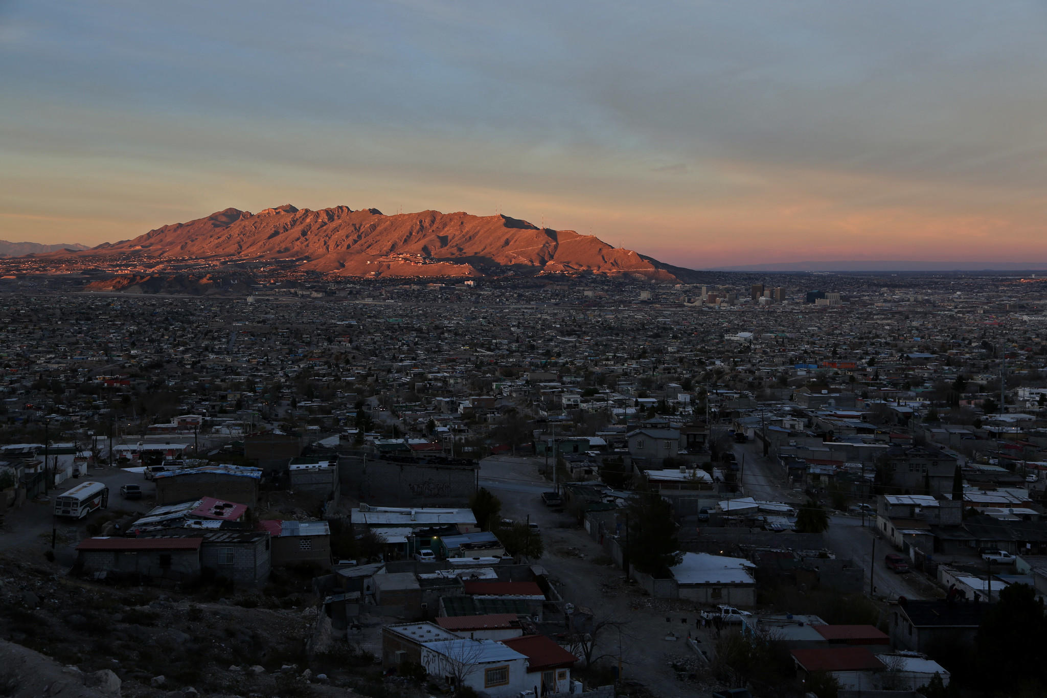 The sun sets over Juarez, Mexico, where many maquiladoras are located.
