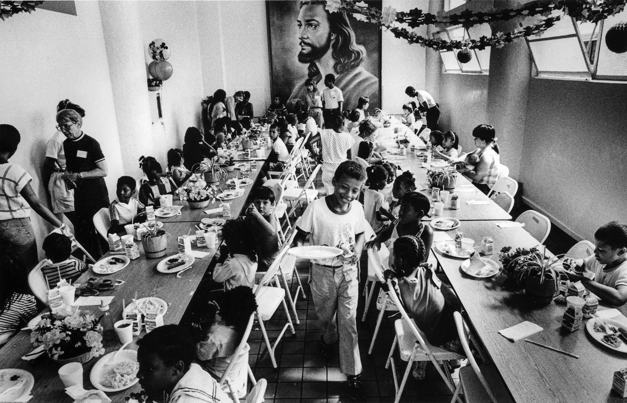 Aug. 11, 1987: Children from skid row hotels and the Urban Campground have breakfast at the Fred Jor