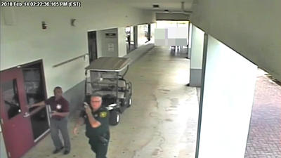 Surveillance video shows what was happening outside during Parkland school shooting