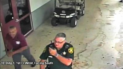 Video shows deputy standing outside Parkland school during shooting