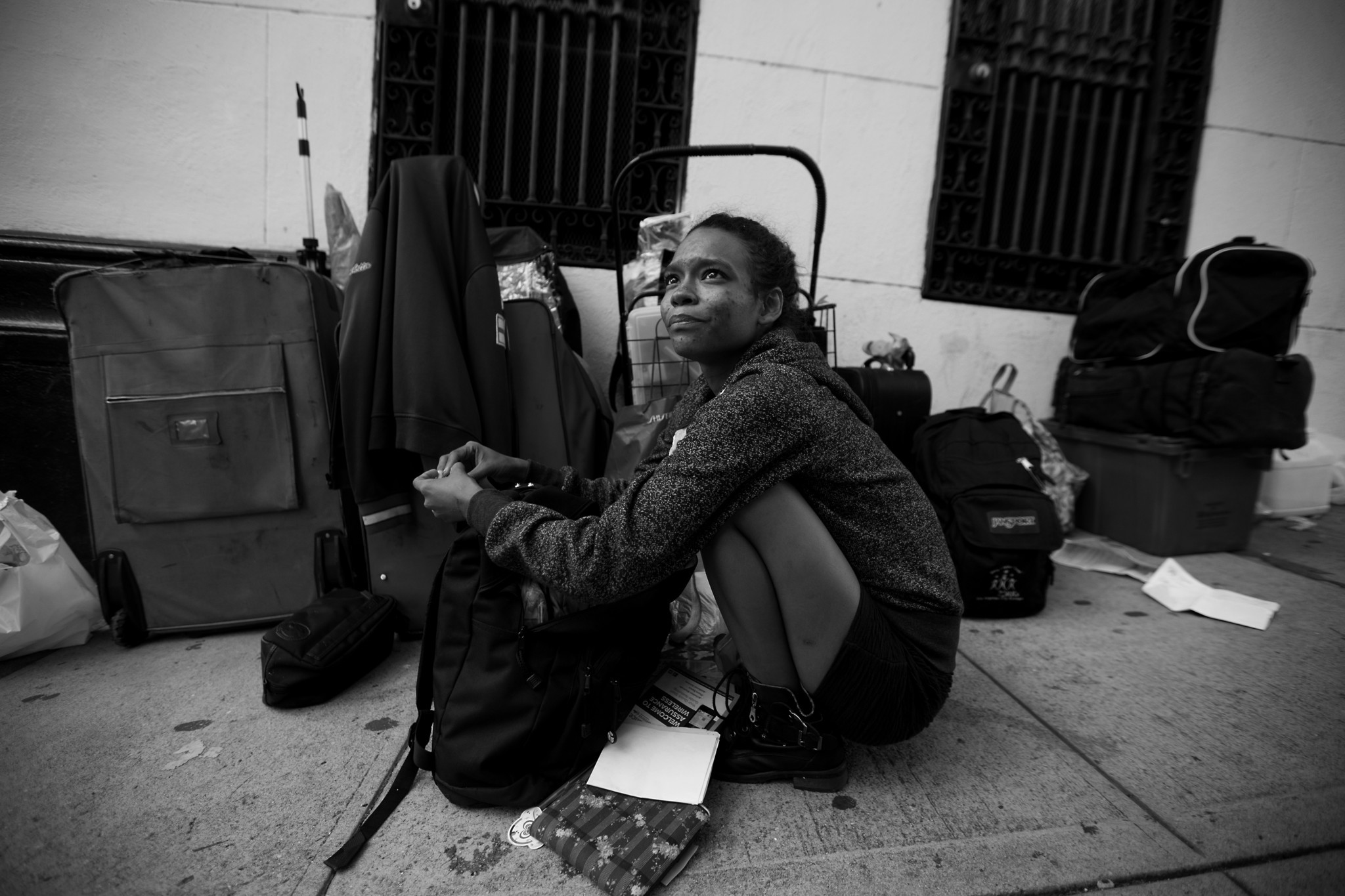 LOS ANGELES, CA NOVEMBER 17, 2017: Shirley Velastegui, (CQ), 22, sits next to her luggage near MacAr