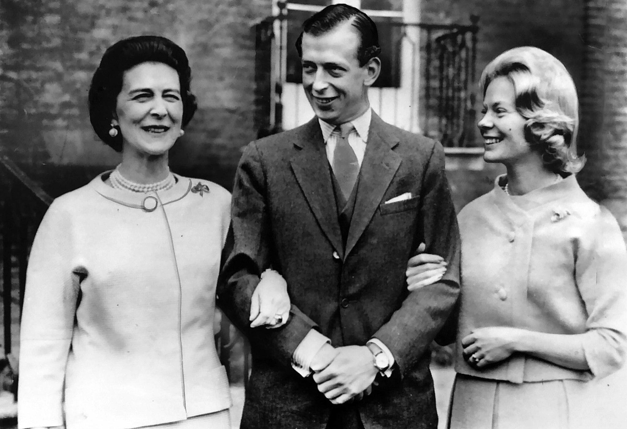 March 11, 1961: Duchess of Kent, at the left, walks with her son, Prince Edward, Duke of Kent and hi