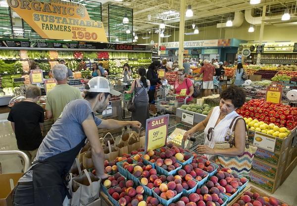Amazon offers big discounts at Whole Foods Market to ...