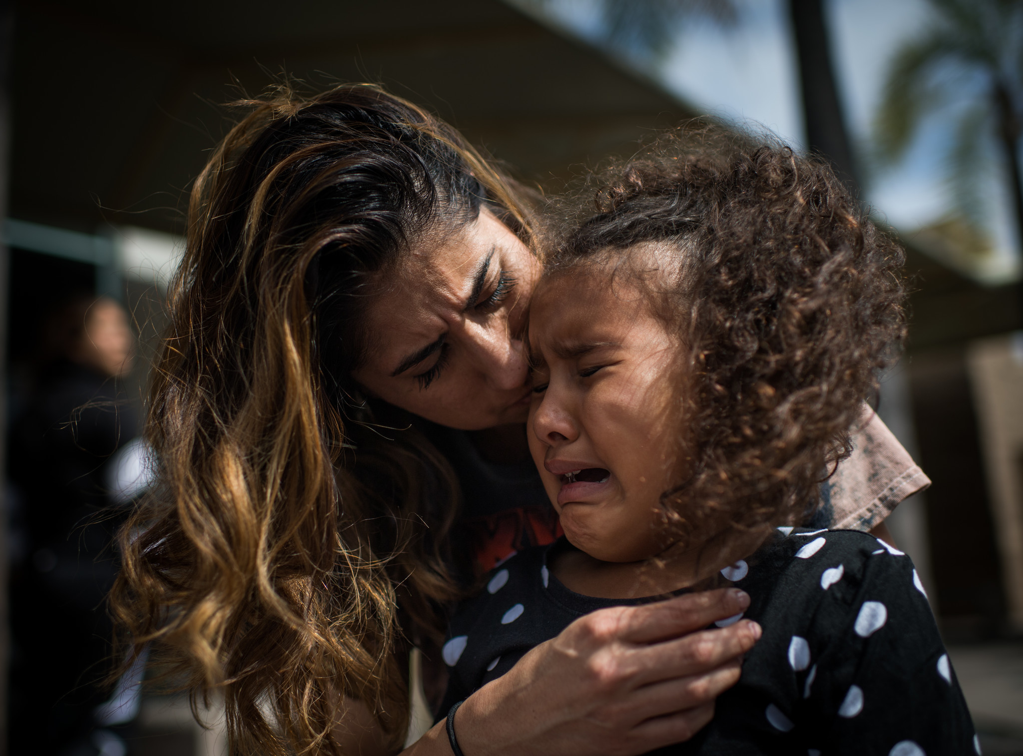 ORANGE, CA - June 23, 2018 Natalie Garcia tries to console her daughter Marley Hodges after a visit