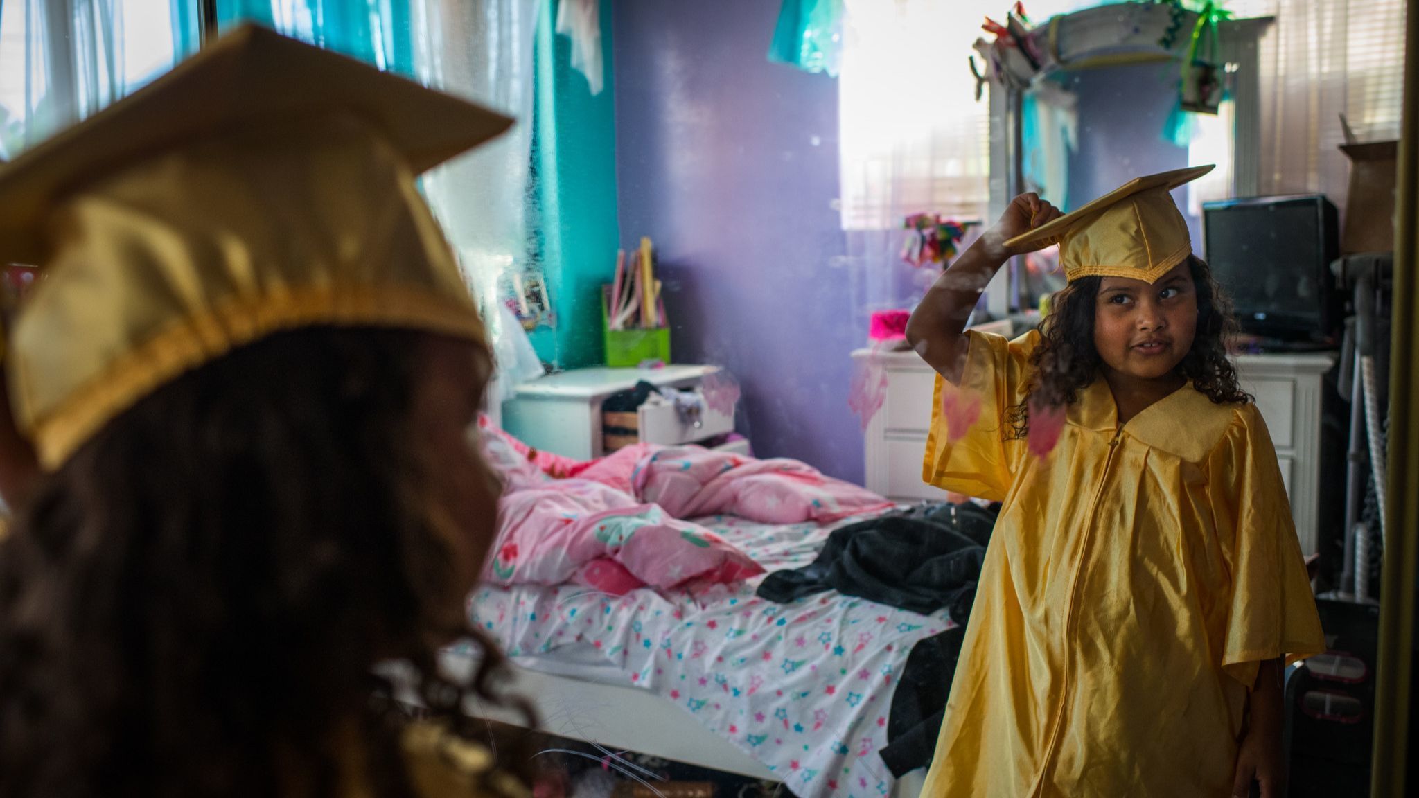 ARLETA, CA - June 21, 2018 Marley prepares for her Kindergarten graduation ceremony at her home in
