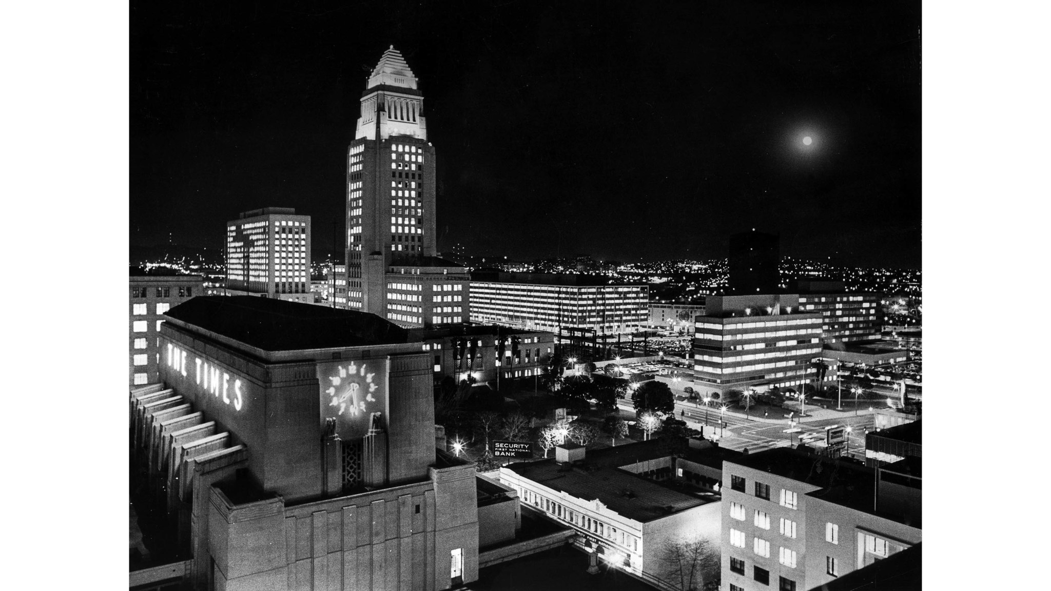 Feb. 4, 1969: Los Angeles City Hall and Los Angeles Times building at night. A full moon is on the r