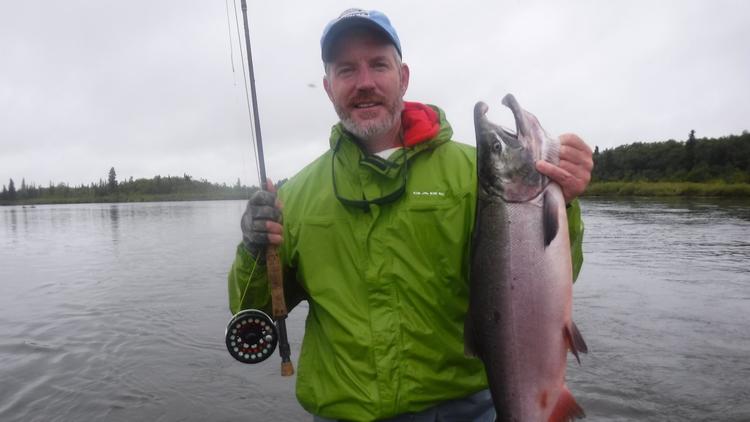 A silver salmon caught by San Diego's Mike Kusler was netted on Alaska's Alagnak River.