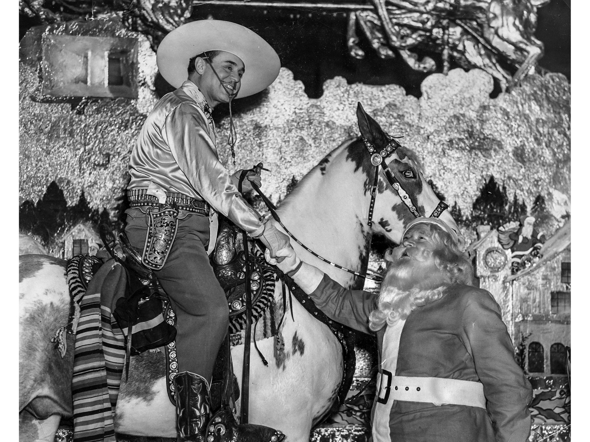 Nov. 27, 1937: Santa Claus greats actor Leo Carrillo to Santa Claus Lane in Hollywood.