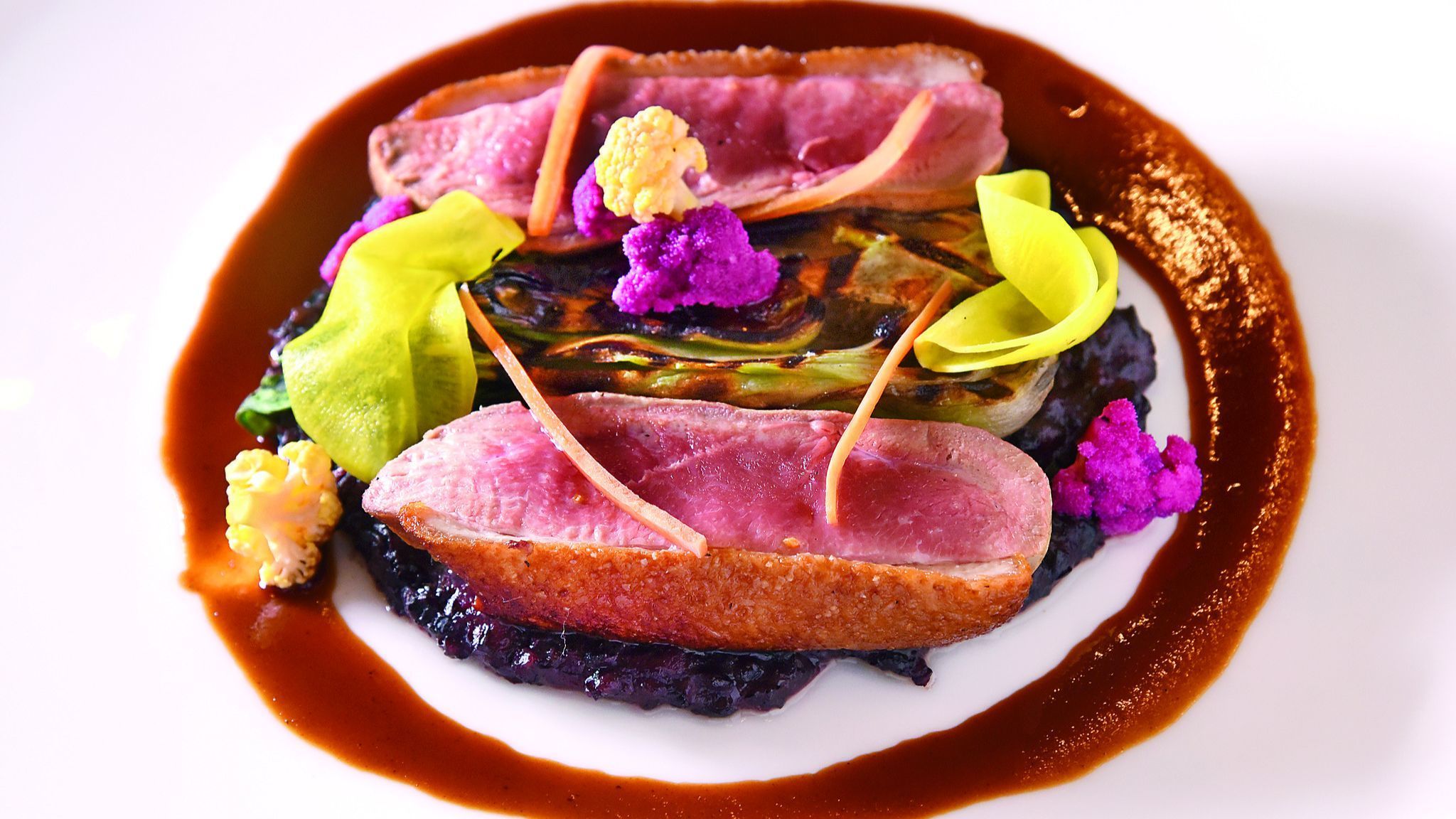 Baltimore, MD - 2/13/19 -- Duck Breast with black rice congi, tumeric-pickled daikon and baby bok ch